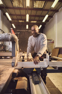 Carpenter working at workshop