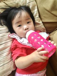 Cute baby girl relaxing at home