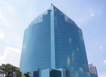 Low angle view of modern buildings against sky