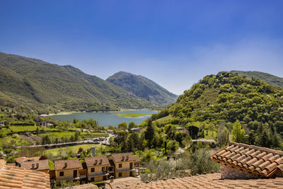 Scenic view of mountains against clear blue sky