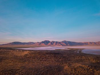 Scenic view of desert against sky