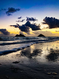 Scenic view of sea against sky during sunset