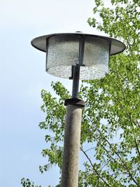 Low angle view of street light against sky