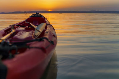 Close-up of sea against sky during sunset