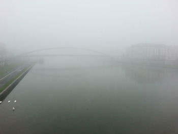View of river in foggy weather