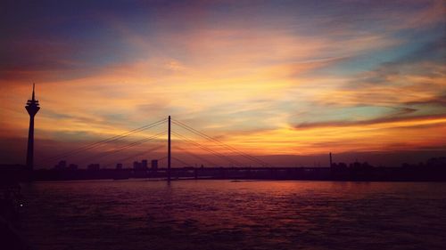 Scenic view of river at sunset