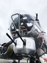 Airplane wing against sky