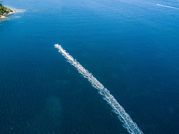 High angle view of ship sailing in sea