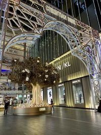 Group of people in illuminated building