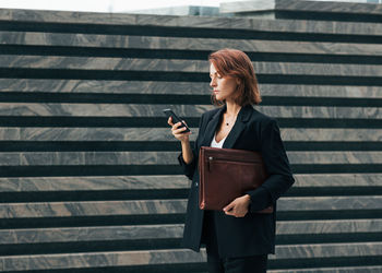 Young woman using mobile phone