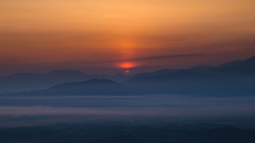 Scenic view of dramatic sky during sunset