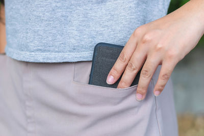 Close-up of hand holding hands