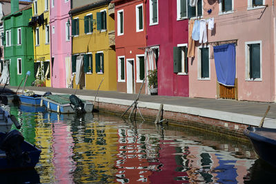 Multi colored buildings in water