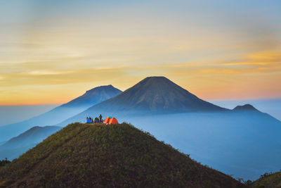 Scenic view of mountains against sky during sunset