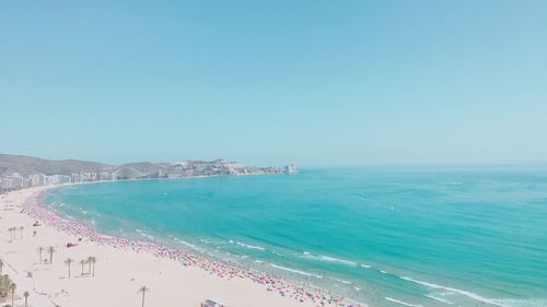 Scenic view of sea against clear blue sky