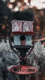 Close-up of rusty sign