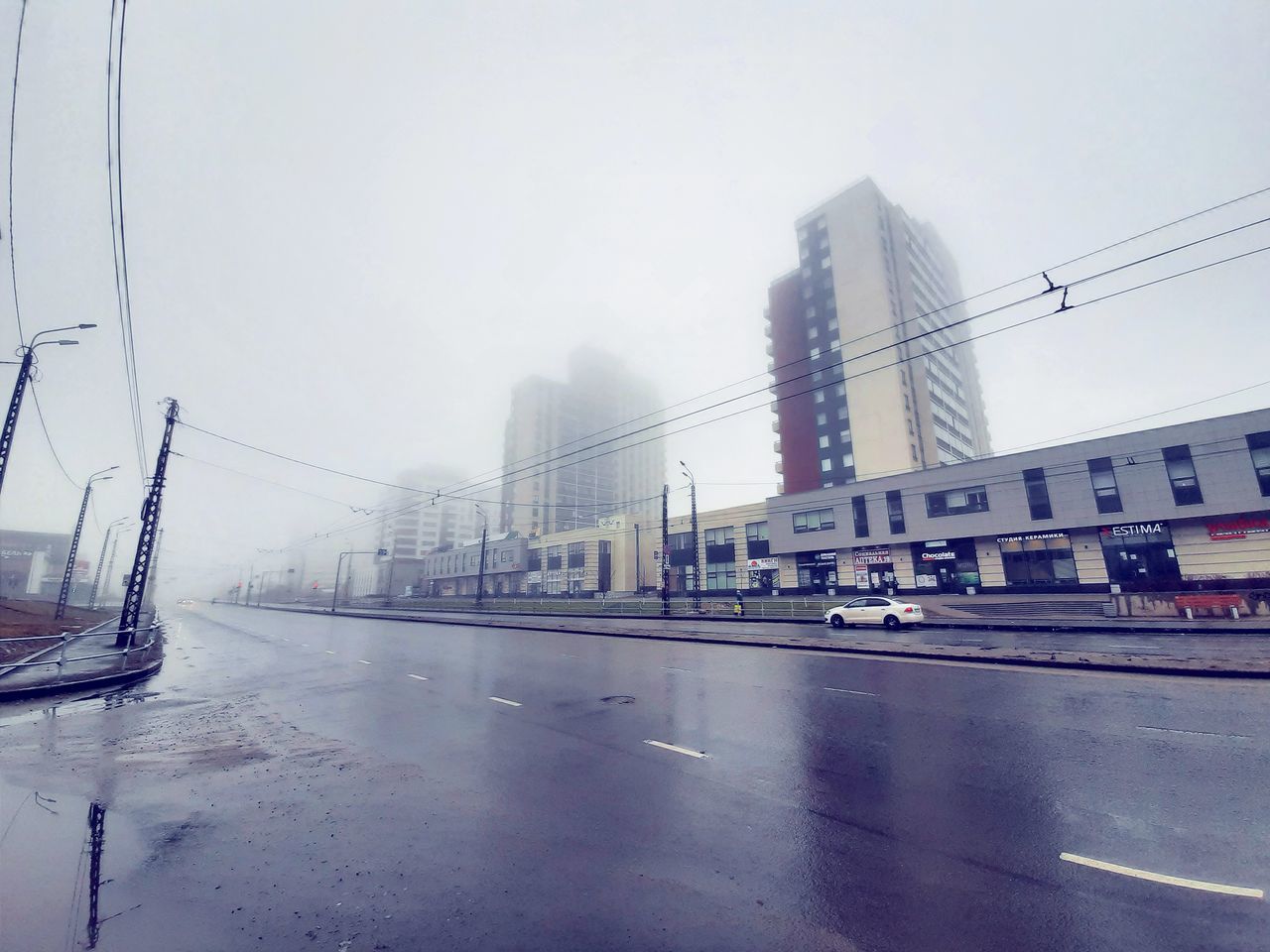 VIEW OF CITY STREET DURING RAINY SEASON