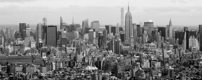 Panoramic view of cityscape against sky