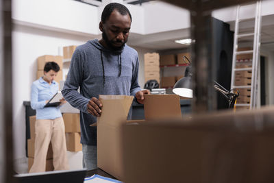 Portrait of young man working at home