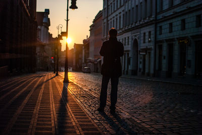 Rear view of man on street