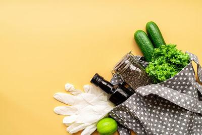 High angle view of food on table against yellow background