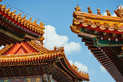 Low angle view of temple building against sky