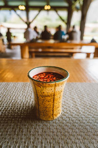 Close-up of drink served on table