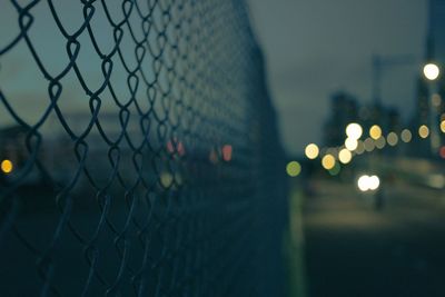 Defocused image of illuminated city at night