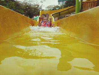 High angle view of children on swimming pool