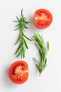 High angle view of fruits against white background