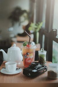 Close-up of coffee cup on table