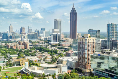 Modern buildings in city against sky