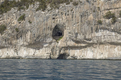 Scenic view of rock formation in sea