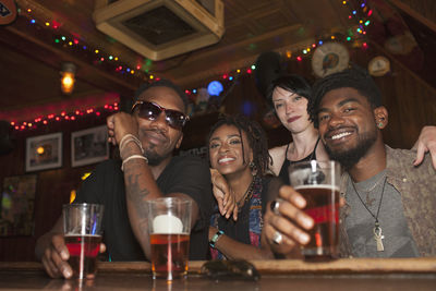 A group of friends at a bar.