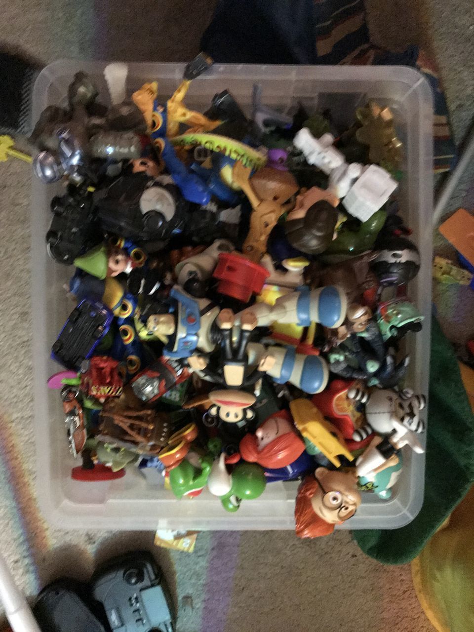 HIGH ANGLE VIEW OF VARIOUS TOYS ON TABLE