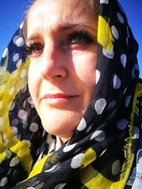 Close-up portrait of a smiling young woman