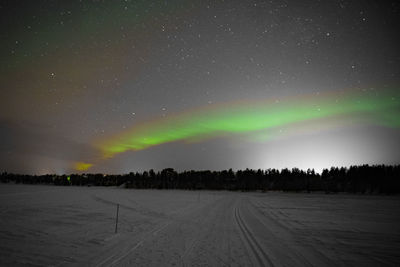 Scenic view of landscape against sky at night