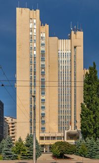 Low angle view of buildings against blue sky