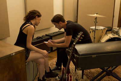 Young musicians taking a break from practice