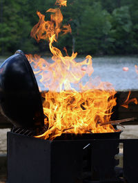 Close-up of fire on barbecue grill