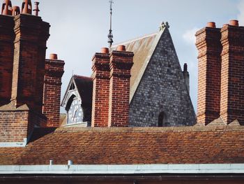 Low angle view of roof against sky