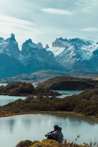 Scenic view of snowcapped mountains and lake against sky