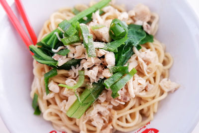 High angle view of chicken noodles served in plate