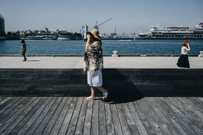 Man standing on pier