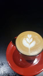 Close-up of cappuccino on table