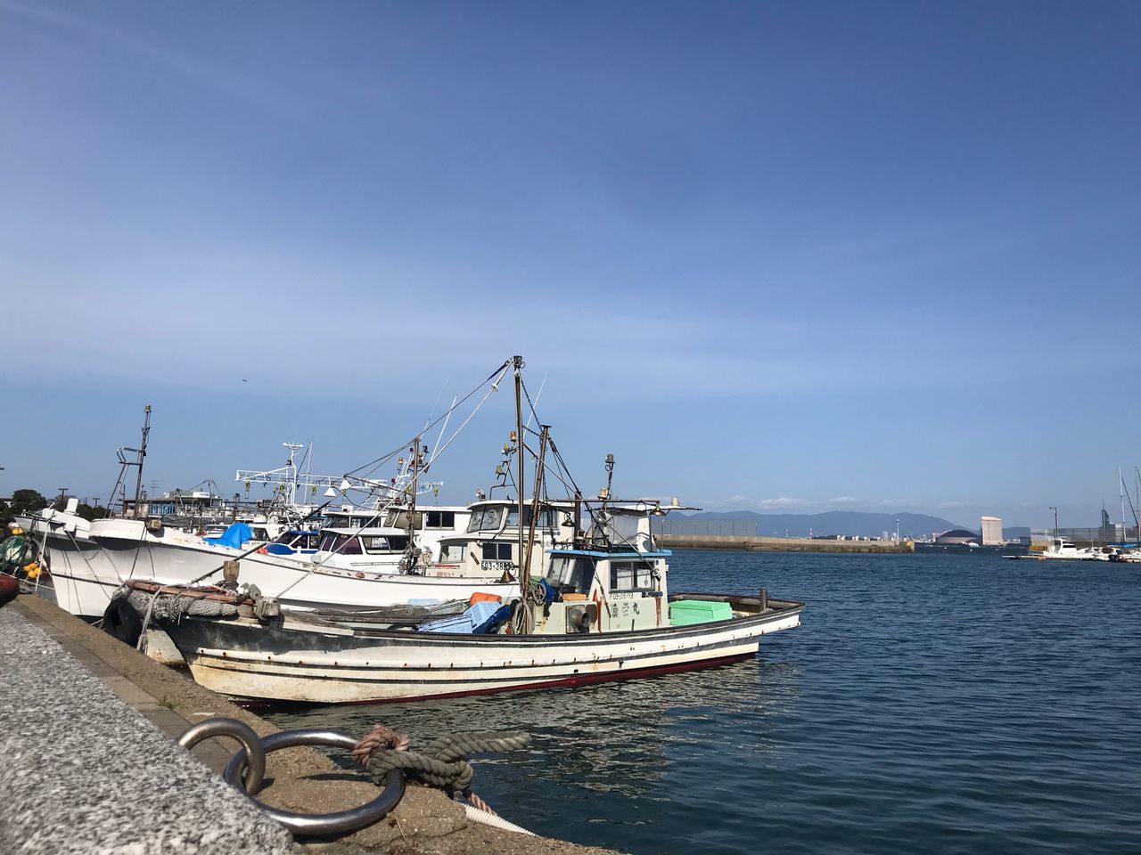 water, nautical vessel, transportation, sky, mode of transportation, sea, harbor, nature, moored, no people, day, architecture, waterfront, building exterior, blue, sailboat, cloud - sky, pole, built structure, outdoors, port, fishing boat, marina, fishing industry