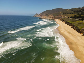 Scenic view of sea against clear sky