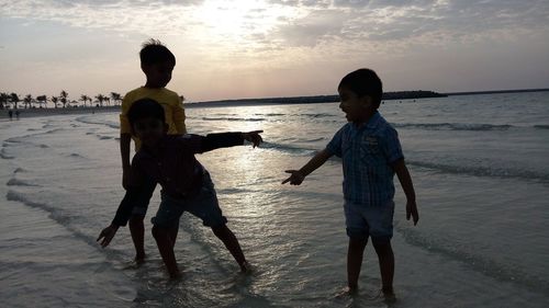 Full length of children on beach