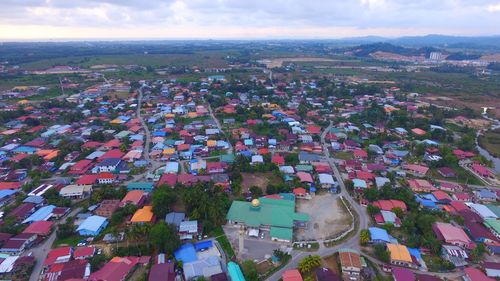 High angle view of townscape against sky in city