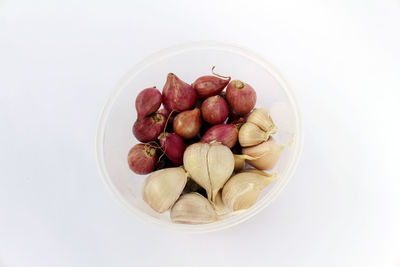 High angle view of fruits in plate on table